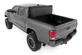 Rough Country Hard Tri-Fold Flip Up Bed Cover for 2005-2015 Toyota Tacoma