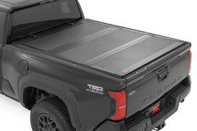 Rough Country Hard Tri-Fold Flip Up Bed Cover for 2024-2026 Toyota Tacoma
