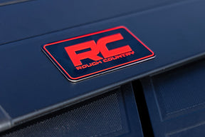 Rough Country Hard Roll up Tonneau Cover for 2019-2026 GM Silverado Sierra 1500 - Recon Recovery
